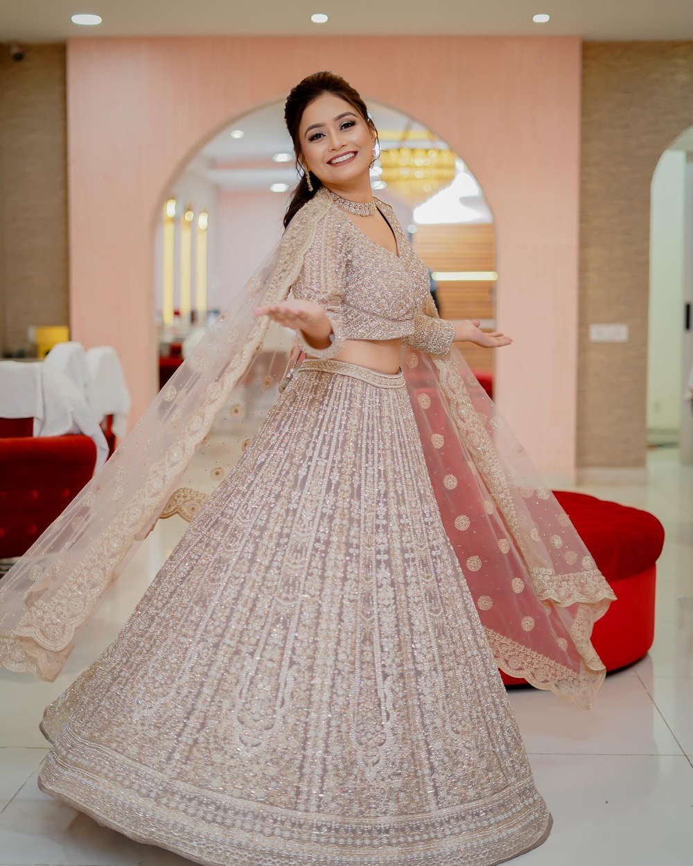 Twirling in a champagne sequinned lehenga at a reception, styling by Fashion World Palampur